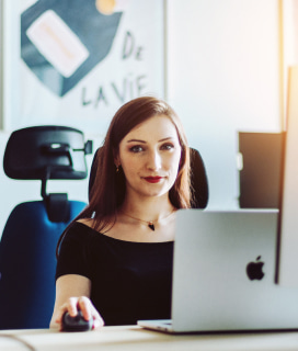 A woman in front of computer