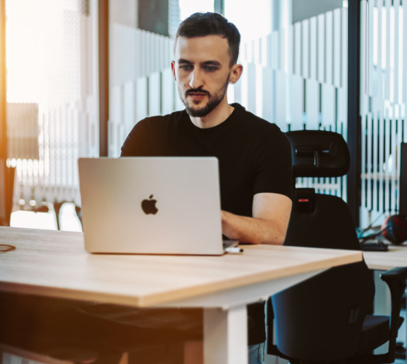 A man in front of laptop